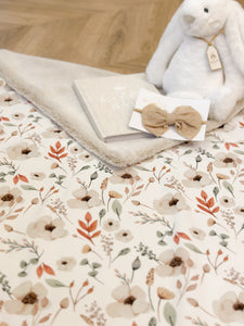 Beige floral blanket