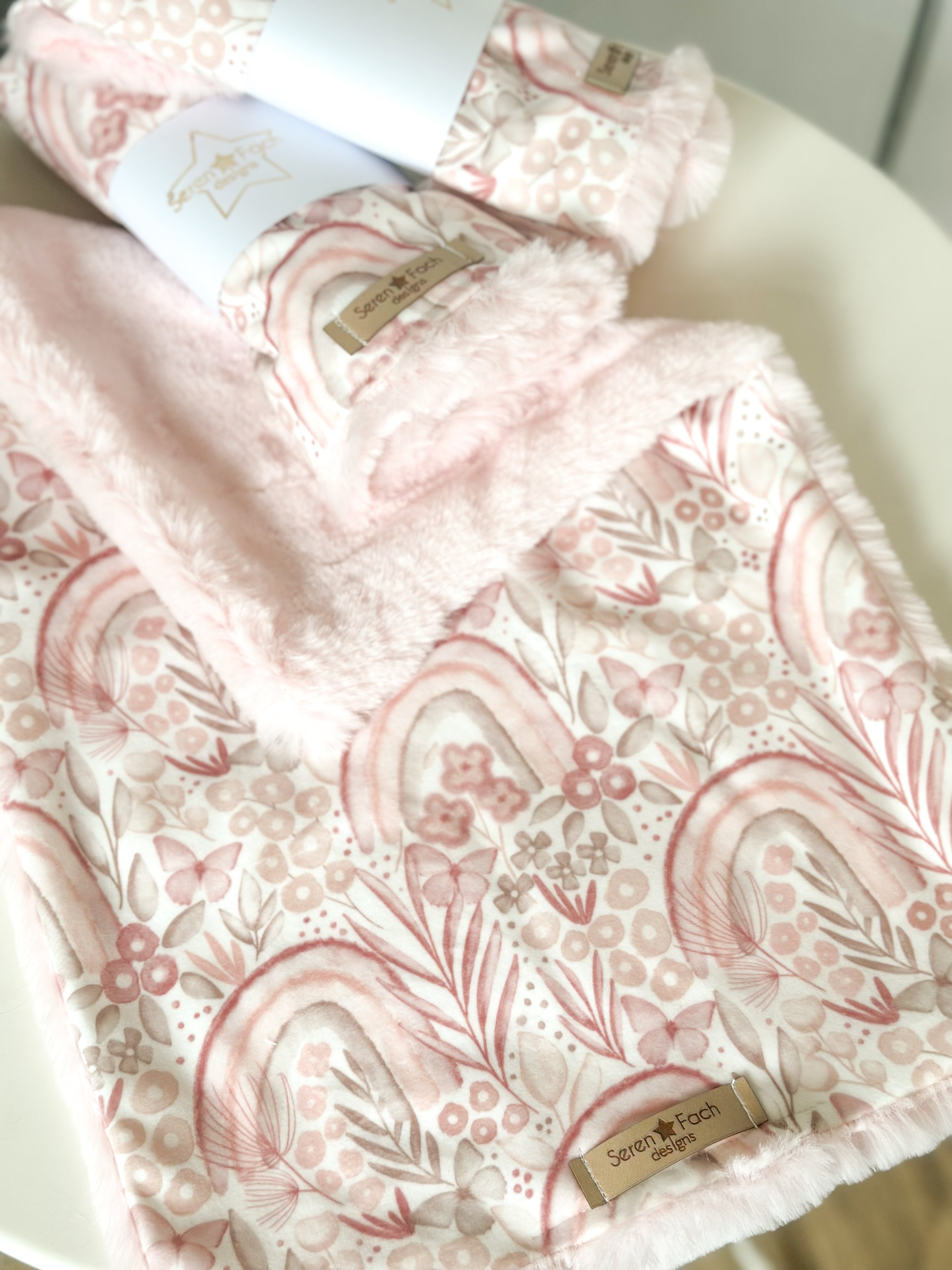 Pink rainbow cuddle comforter