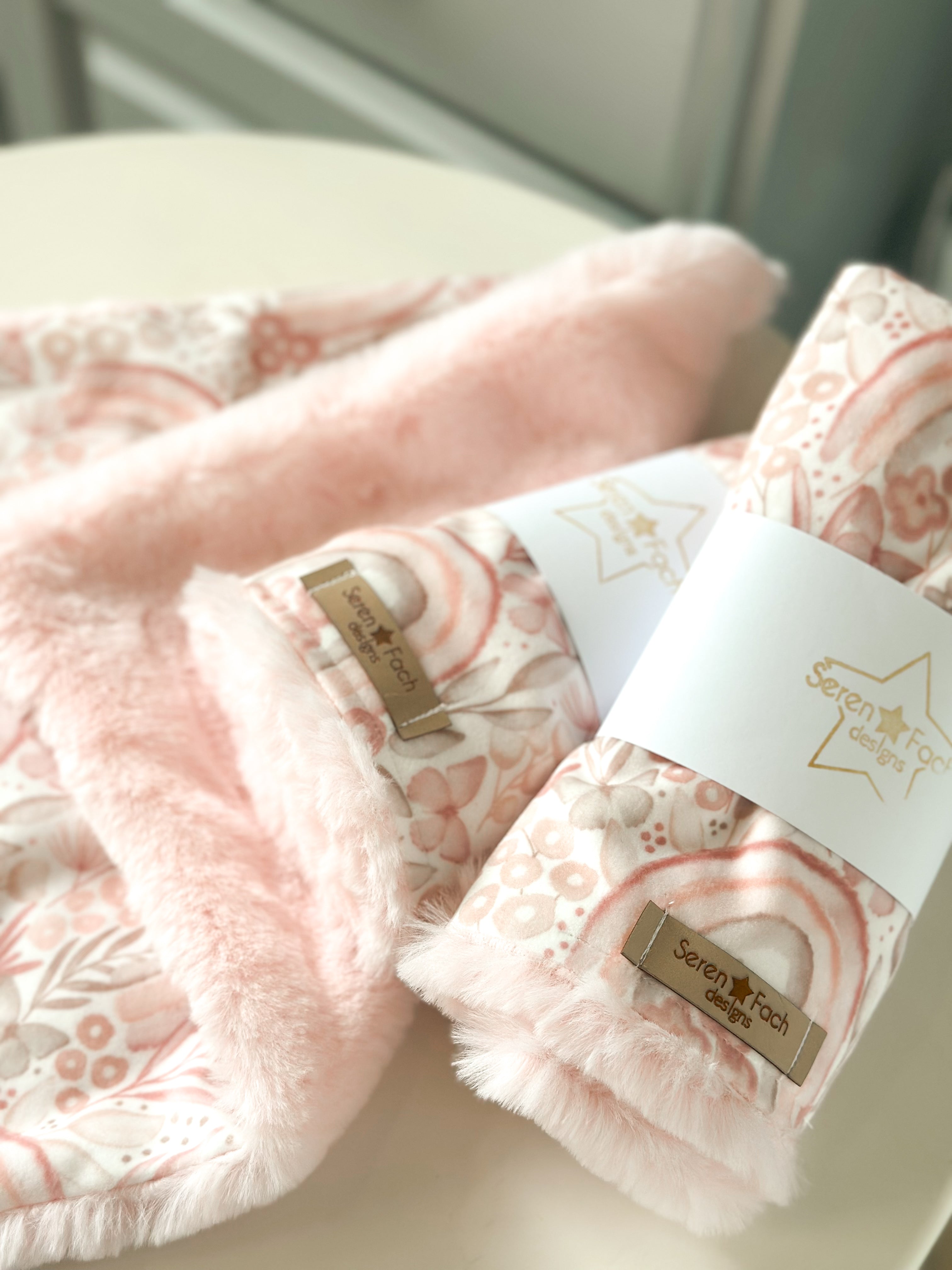 Pink rainbow cuddle comforter