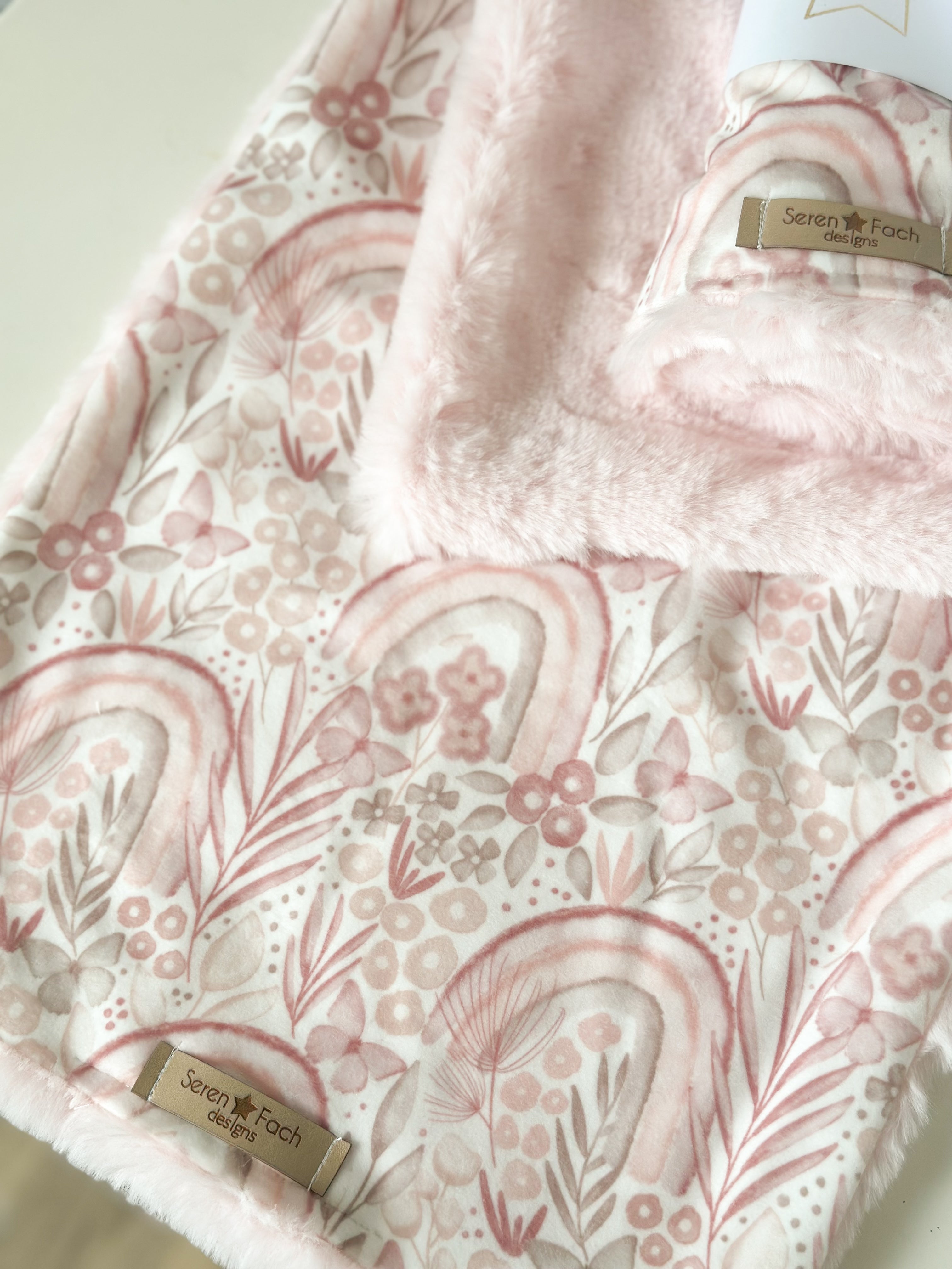 Pink rainbow cuddle comforter