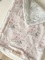 Load image into Gallery viewer, Pink carousel cuddle comforter
