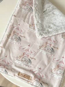 Pink carousel cuddle comforter