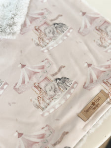 Pink carousel cuddle comforter