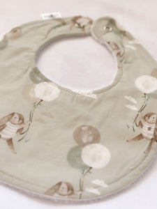 Green bunny with balloon bib