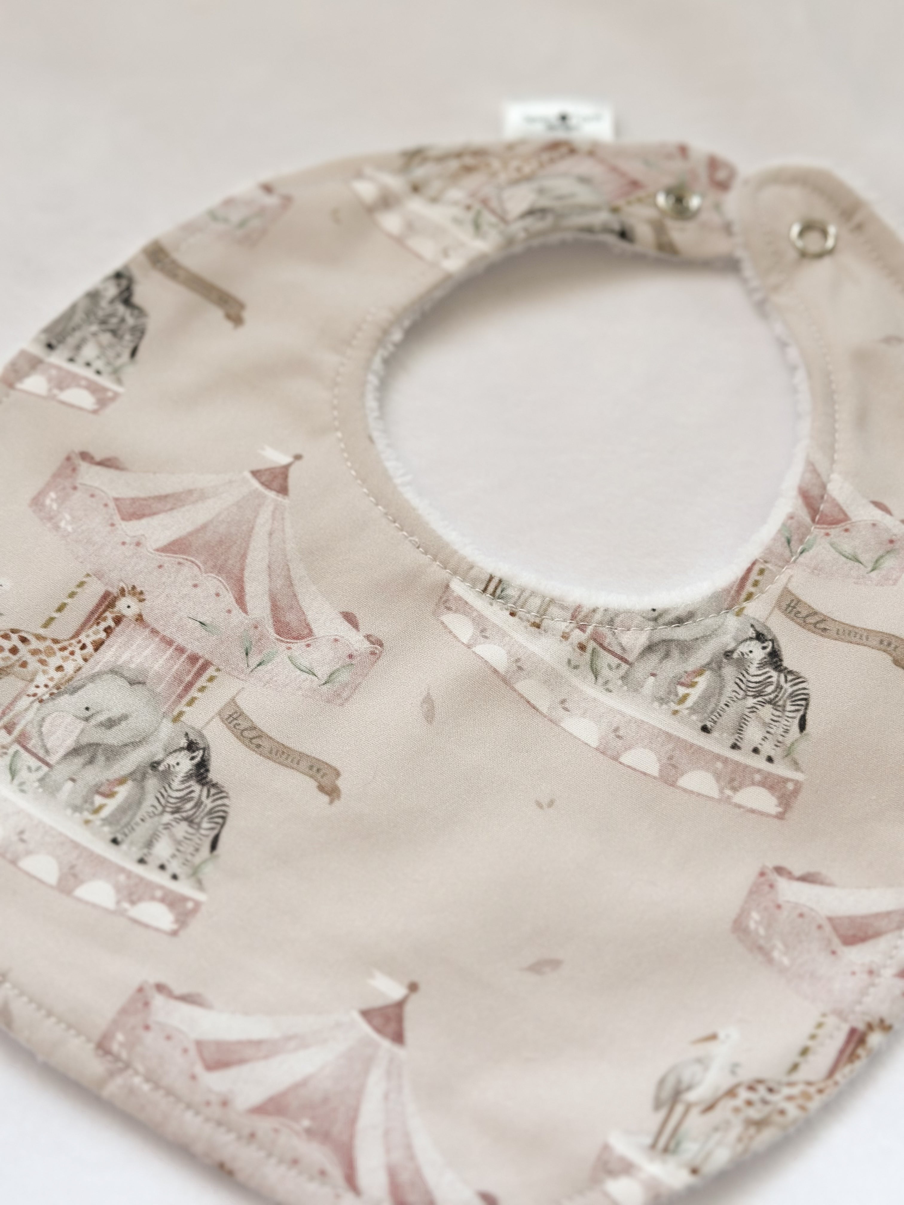 Pink carousel bib