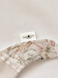 Pink carousel bib