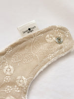 Load image into Gallery viewer, Embroidered beige linen bib
