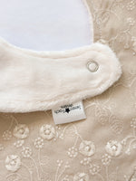 Load image into Gallery viewer, Embroidered beige linen bib
