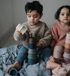 Stacking Cups in Forest